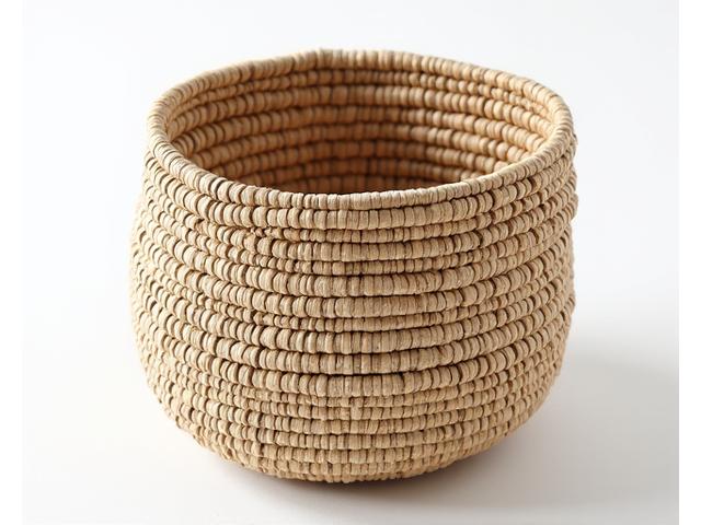 Unique coil woven basket with colorful accents